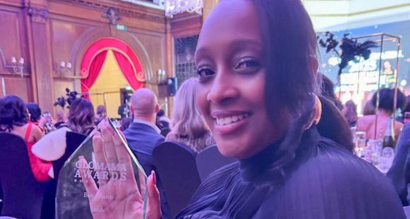 Rachel Burrell Sands volunteer collects Sands Charity of the Year Award Glomama 2025