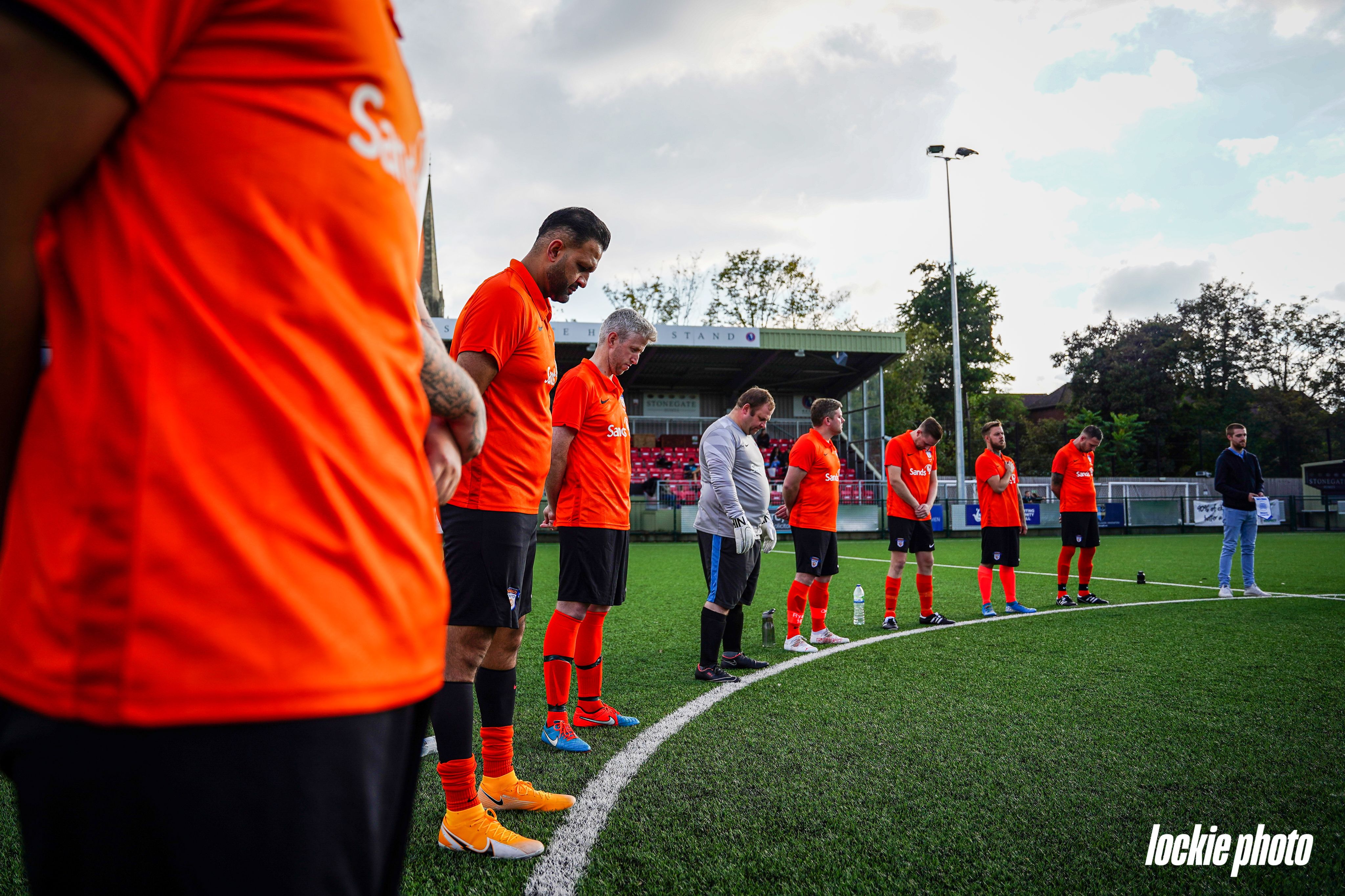 Bereaved dads having a moment of silence for their babies during a Sands United Charity match.