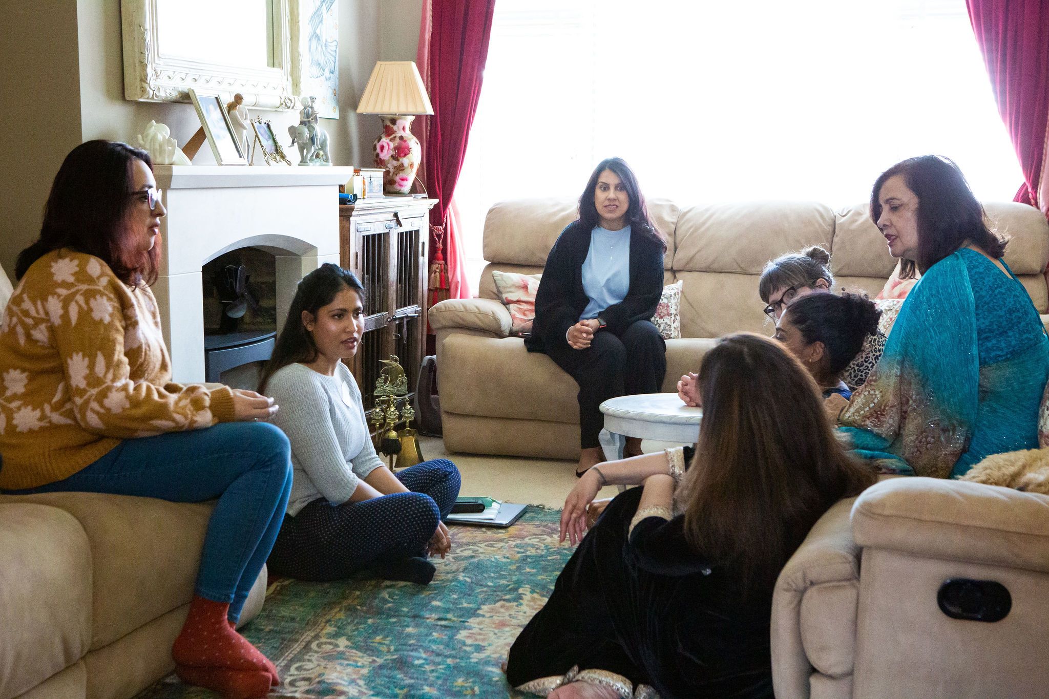 Group of South Asian mothers having a dicussion.