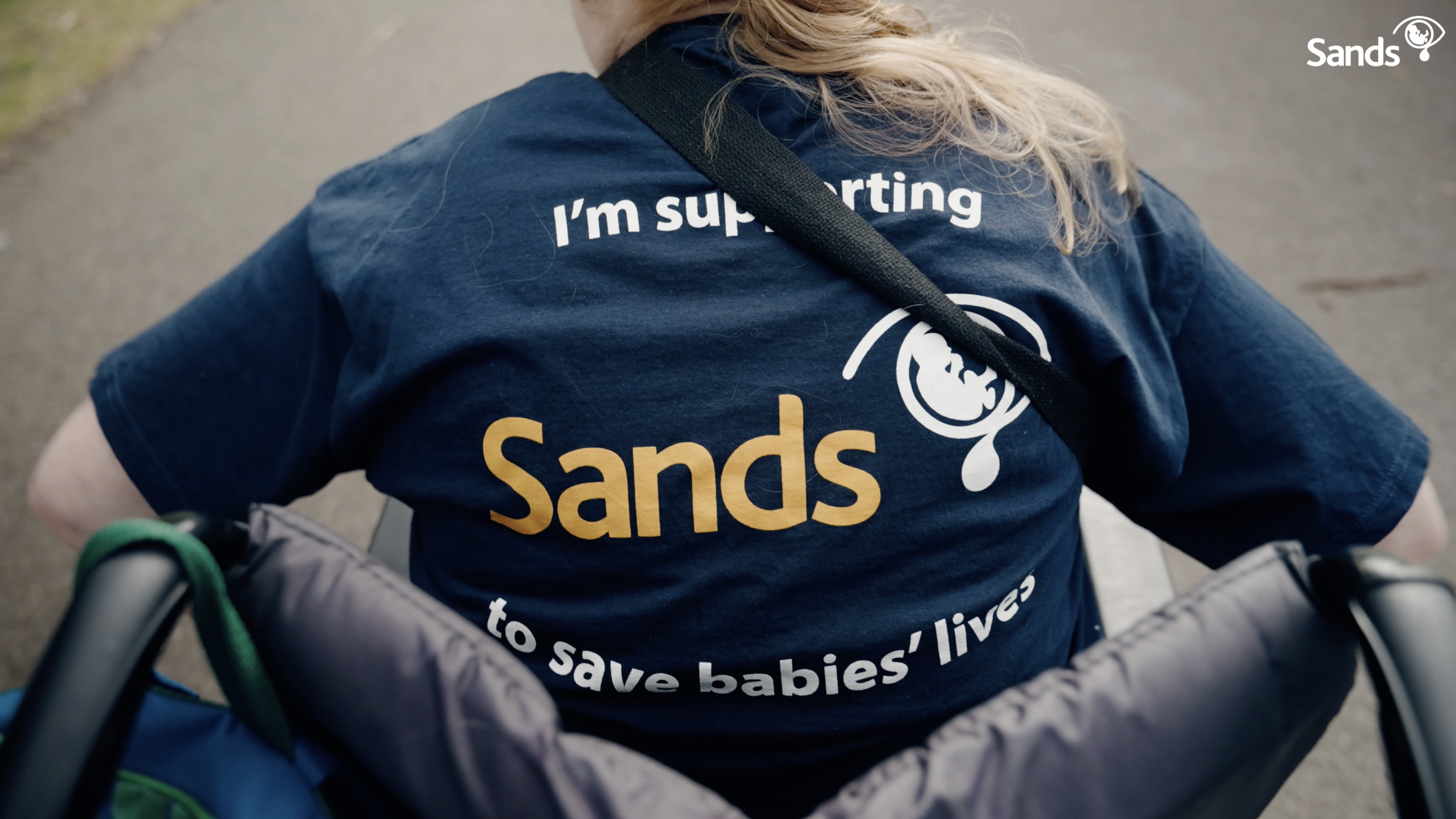 Supporter in a wheelchair fundraising for Sands.